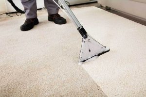 Green Choice Employee Cleaning carpet in Cadman Plaza area 